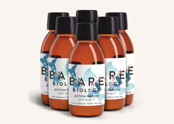 Six bottles of Bare Biology Action Heroes Pure Omega-3 liquid for children on a white background