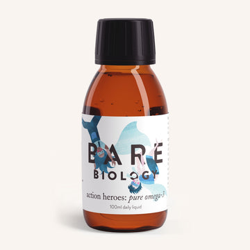 A Bare Biology brown bottle with a black cap, labeled Pure Omega-3 Fish Oil for Kids, contains Action Heroes: Pure Omega-3, 100ml. This supplement includes DHA for brain growth and features blue and red accents with abstract human figures.