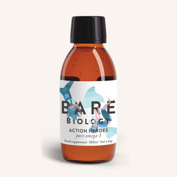 A Bare Biology brown bottle with a black cap, labeled Pure Omega-3 Fish Oil for Kids, contains Action Heroes: Pure Omega-3, 100ml. This supplement includes DHA for brain growth and features blue and red accents with abstract human figures.