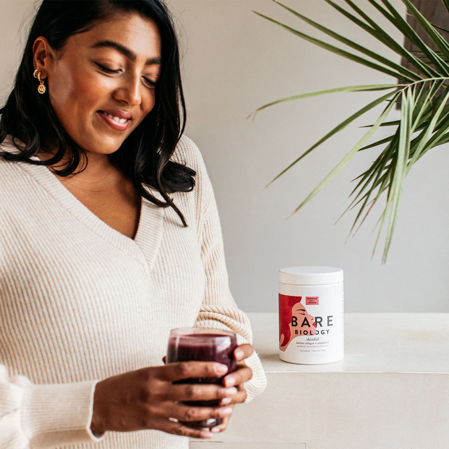 woman holding Collagen Supplements