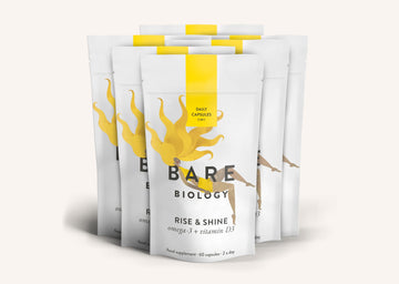 Rows of Bare Biology Rise and Shine Omega-3 and Vitamin D3 supplement pouches on a white background