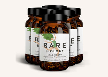 Six jars of Bare Biology Vim and Vigour Vegan Omega-3 supplement with colourful green label on a white background