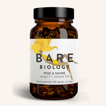 The Rise & Shine Omega-3 Plus Vitamin D3 Capsules by Bare Biology features a label with a yellow illustration of a person. This health and immunity supplement contains 60 capsules, rich in omega-3 and vitamin D3, suitable for twice-daily intake.