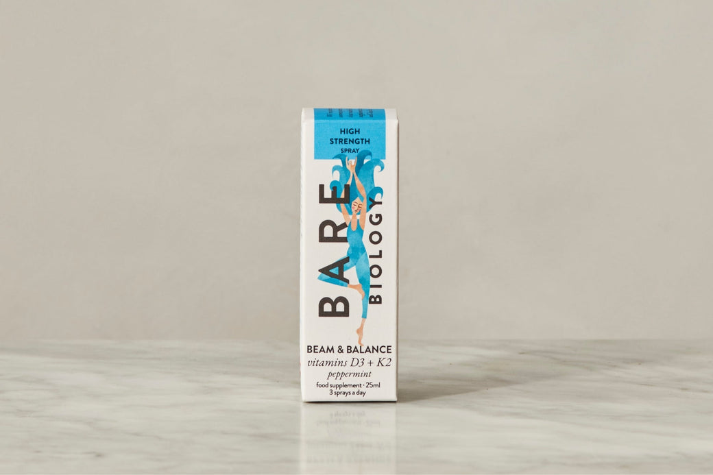 Bare Biology carton of Vitamin D3+K2 Spray with a colourful lady illustration on the front