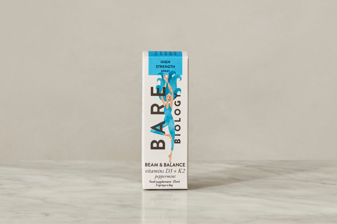 Bare Biology carton of Vitamin D3+K2 Spray with a colourful lady illustration on the front