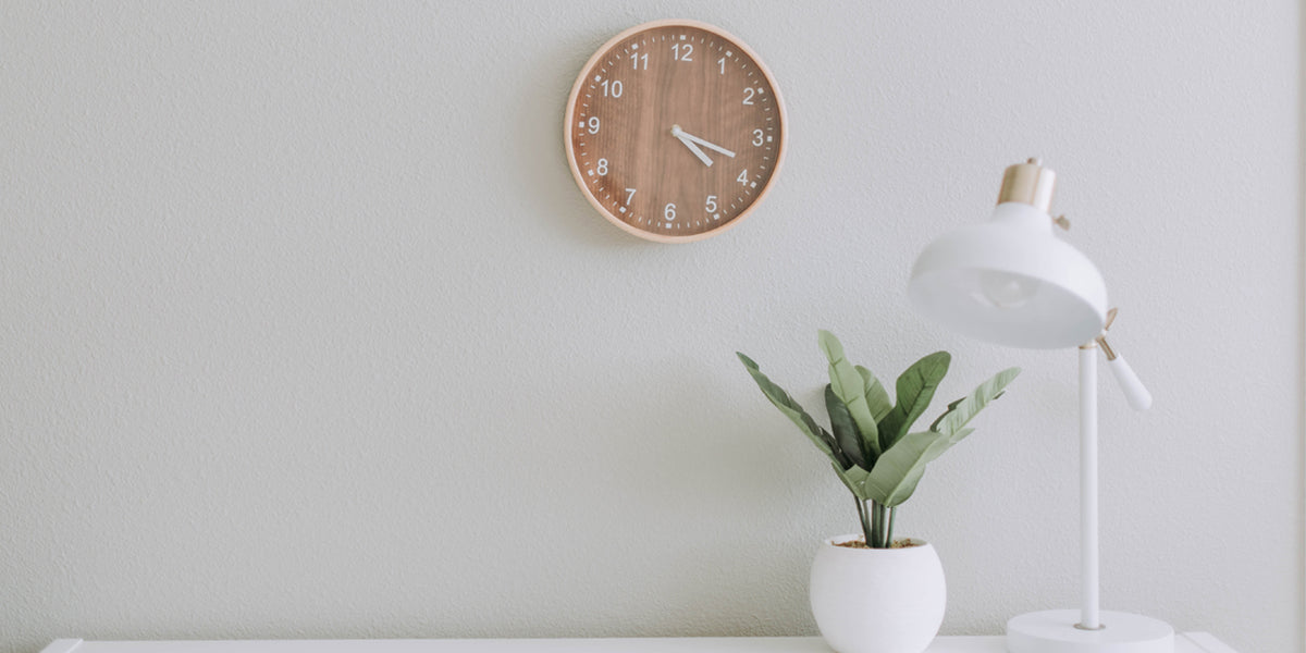 table-with-clock-and-lamp