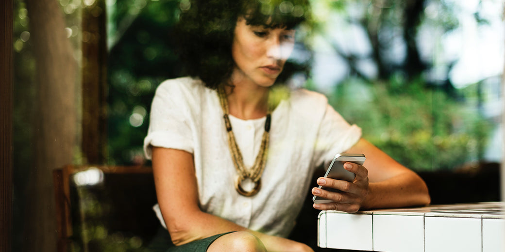Woman-checking-her-phone