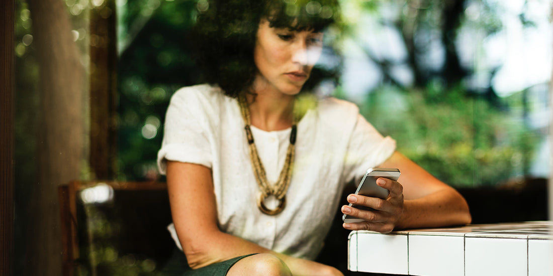 Woman-checking-her-phone