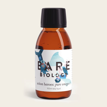 A Bare Biology brown bottle with a black cap, labeled Pure Omega-3 Fish Oil for Kids, contains Action Heroes: Pure Omega-3, 100ml. This supplement includes DHA for brain growth and features blue and red accents with abstract human figures.