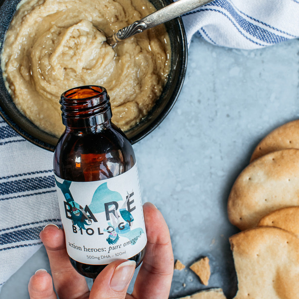 action heroes omega 3 liquid for kids in hummus with crackers