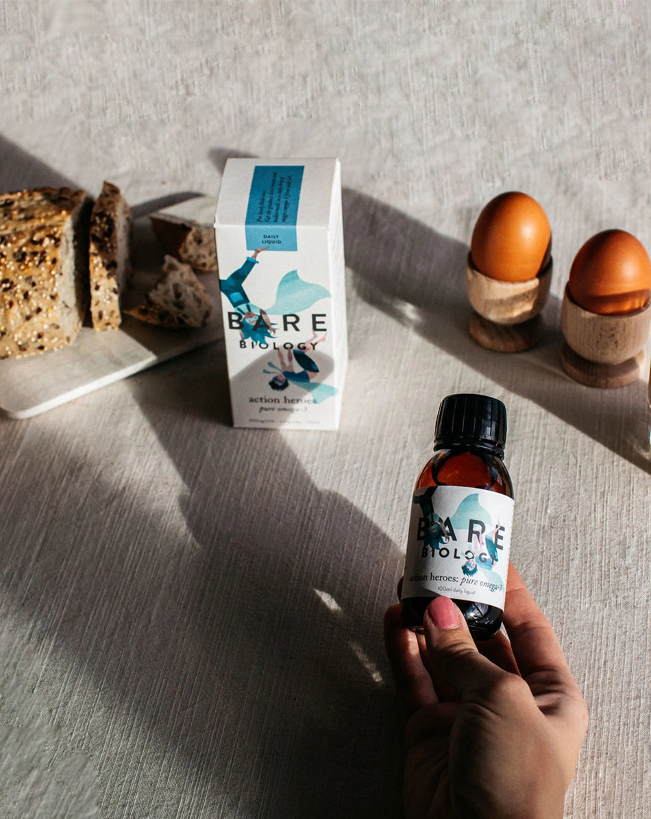action heroes liquid box and bottle with eggs and bread
