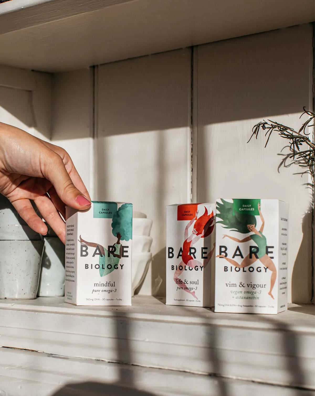 bare biology omega 3 capsules selection on a sunny kitchen shelf