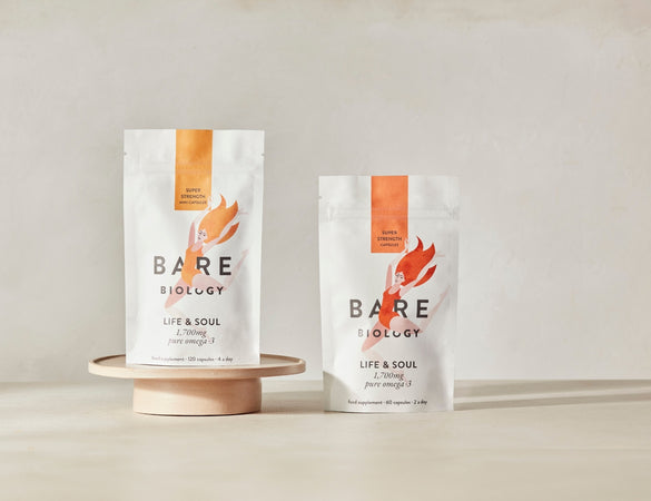 Two 'Bare Biology' supplement packages on a neutral background