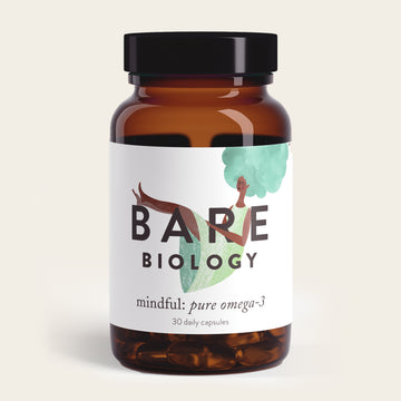 A brown Bare Biology glass bottle holds Pure DHA Omega-3 Capsules. Its label depicts a person in a green outfit with a large hairstyle on a light background, emphasizing the supplements purity.