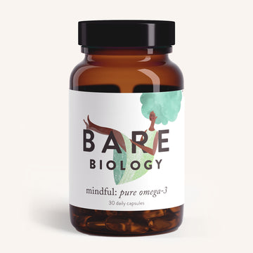 A brown Bare Biology glass jar holds Pure DHA Omega-3 Capsules. Its label depicts a person in a green outfit with a large hairstyle on a light background, emphasizing the supplements purity.