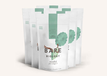 Rows of Bare Biology Mindful Supplement pouches on a white background