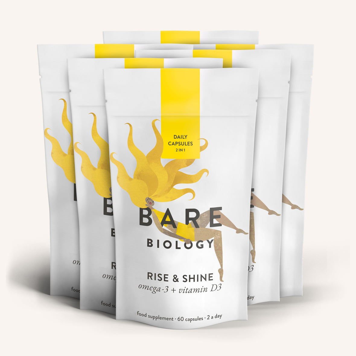 Bare Biologys Rise & Shine Omega-3 Plus Vitamin D3 Capsules come in white and yellow pouches, ideal for health and immunity. The packaging features a person stretching with a sun motif and contains 60 capsules.