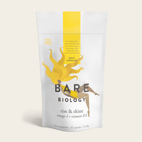 A white pouch of Bare Biologys Rise & Shine Omega-3 Plus Vitamin D3 capsules, featuring a stylized person with flowing hair, contains 60 daily health and immunity supplements.