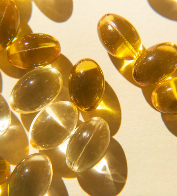 close up of bare biology omega 3 life and soul mini capsules in the sunshine