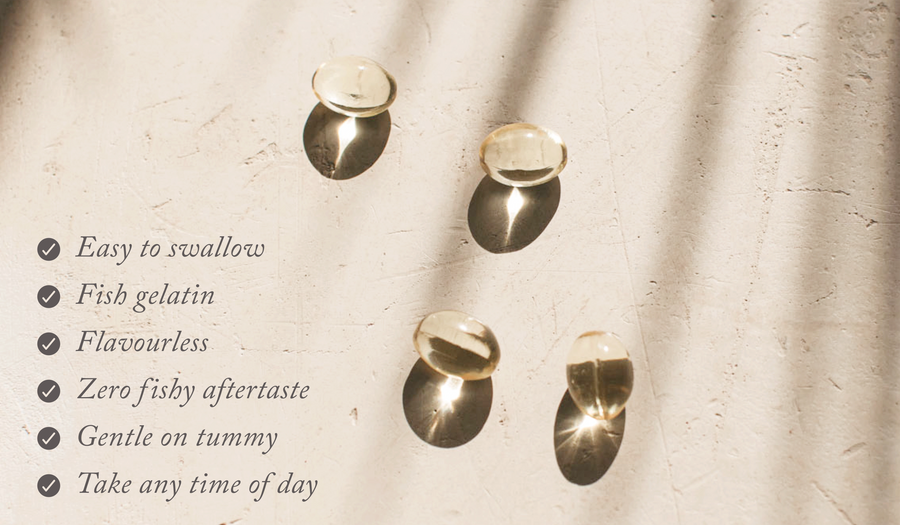 4 bare biology life & soul mini omega 3 fish oil capsules on a sunny table with shadows of a plant
